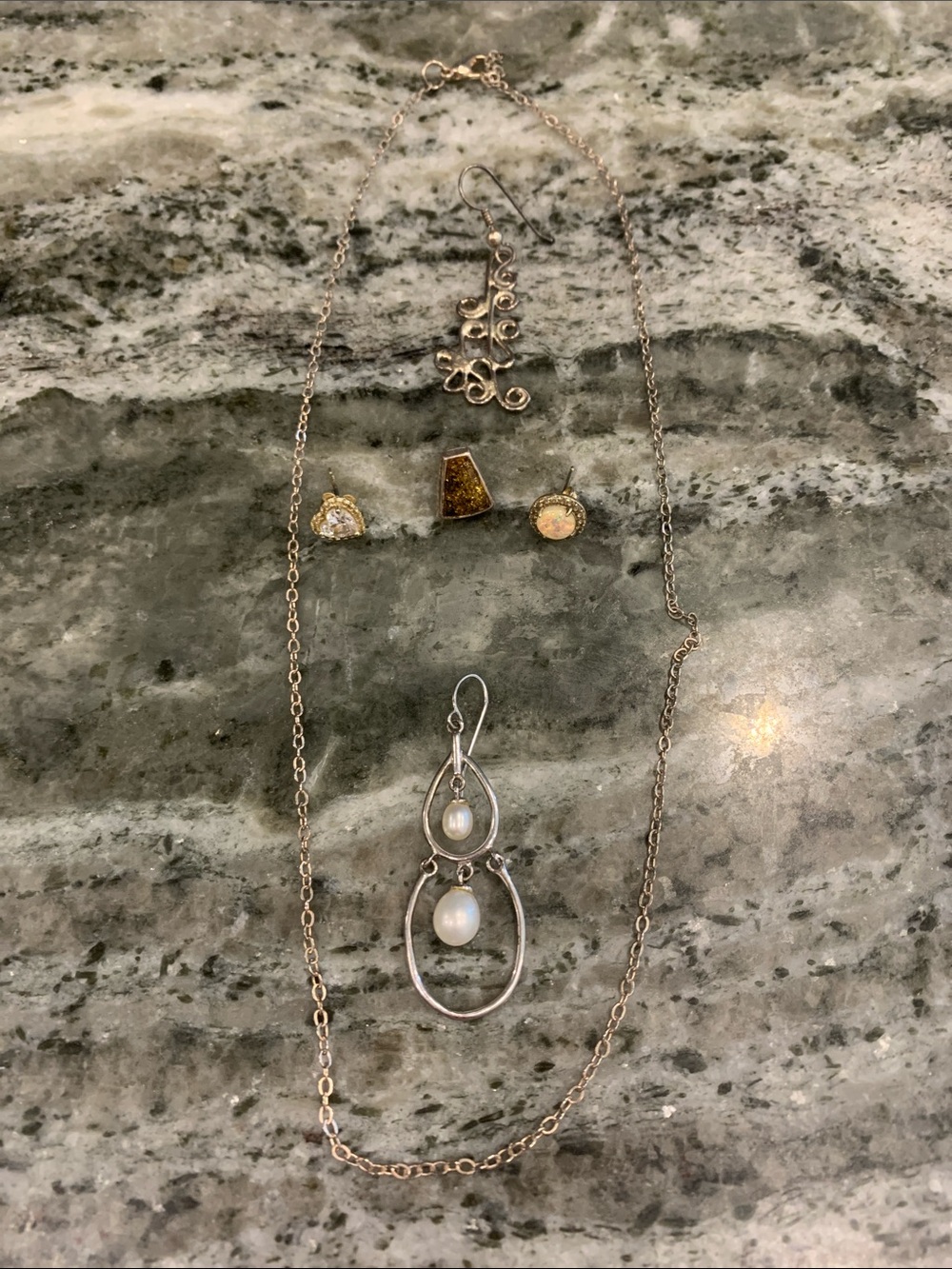 Random jewelry pieces:  Earrings and Chain Necklace